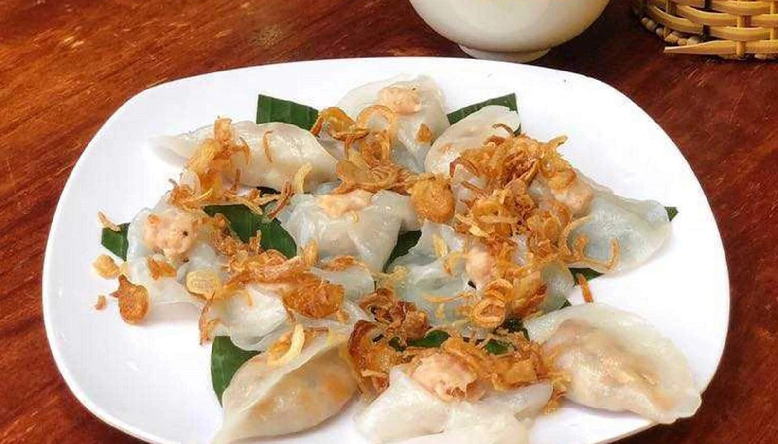 Tet in Hoi An: Wigo Tourist's 2025 Festive Guide 18 White rose dumplings: Culinary delights of Hoi An